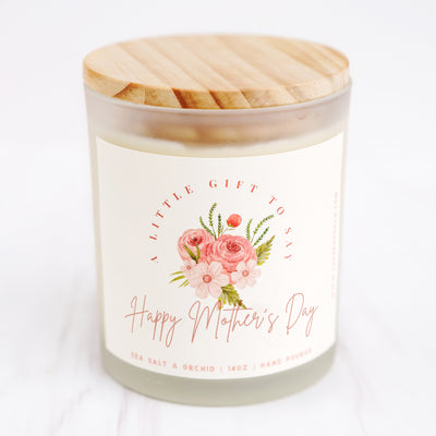 a jar of happy mother's day candle with a wooden lid