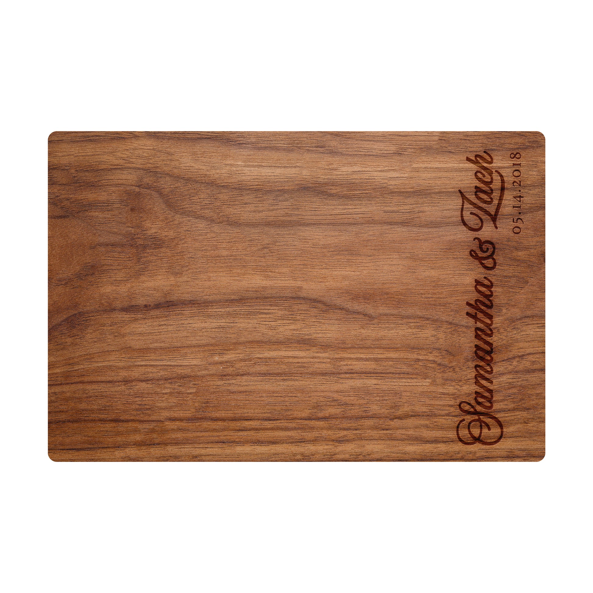 a wooden cutting board with a name on it