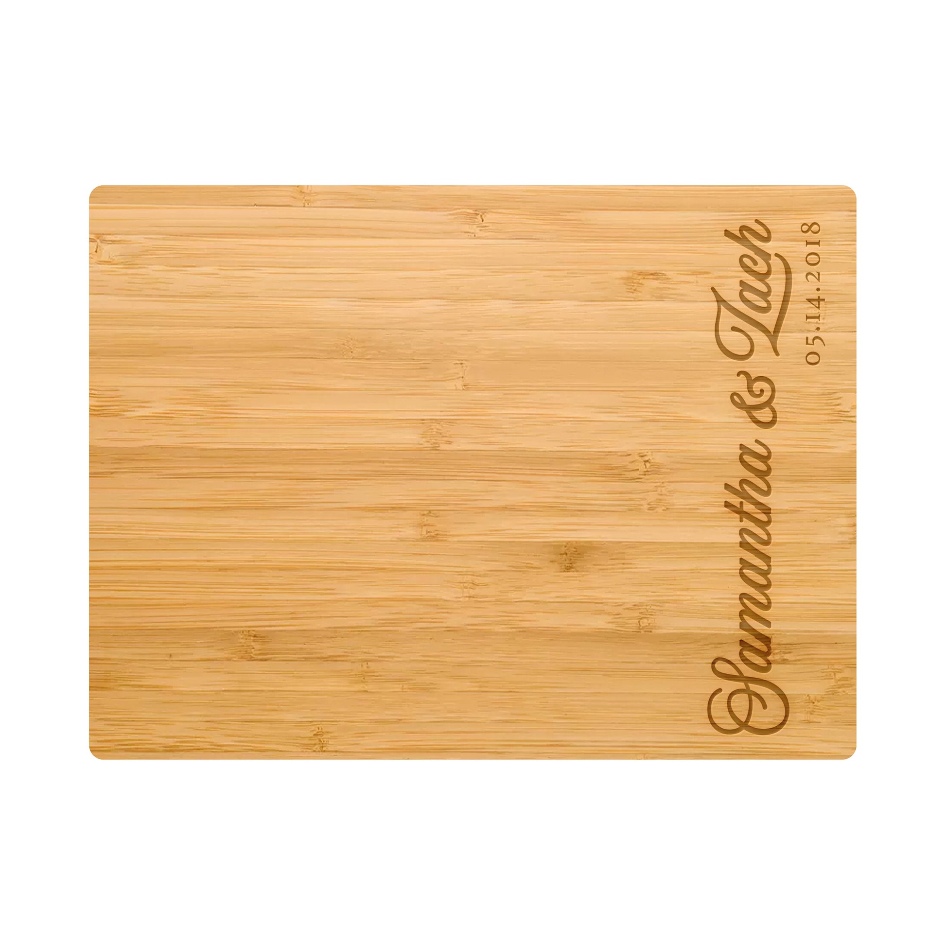 a bamboo cutting board with a name on it