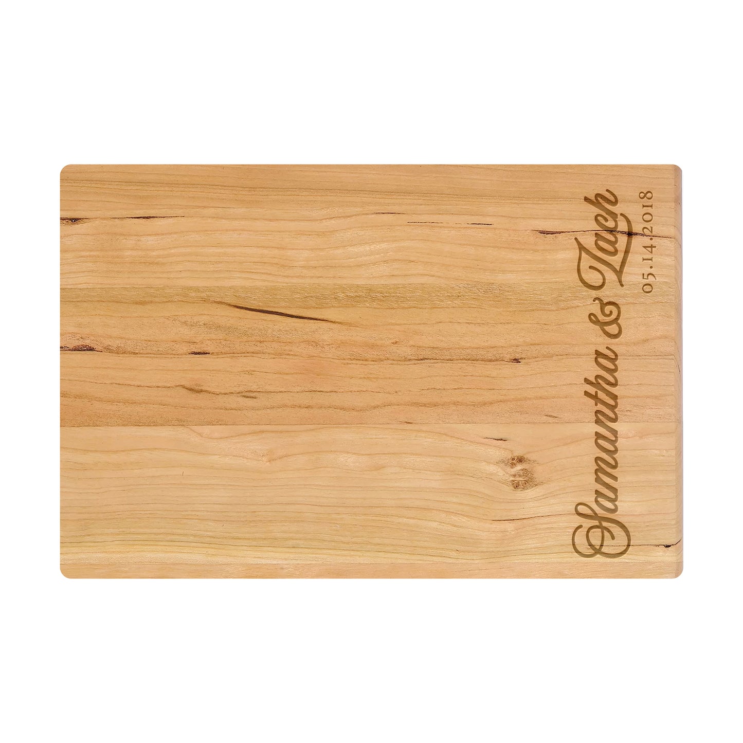 a wooden cutting board with a name on it