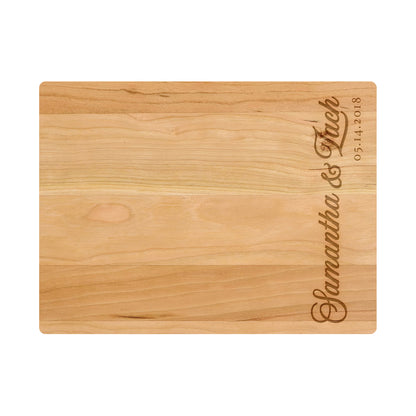 a wooden cutting board with a name on it