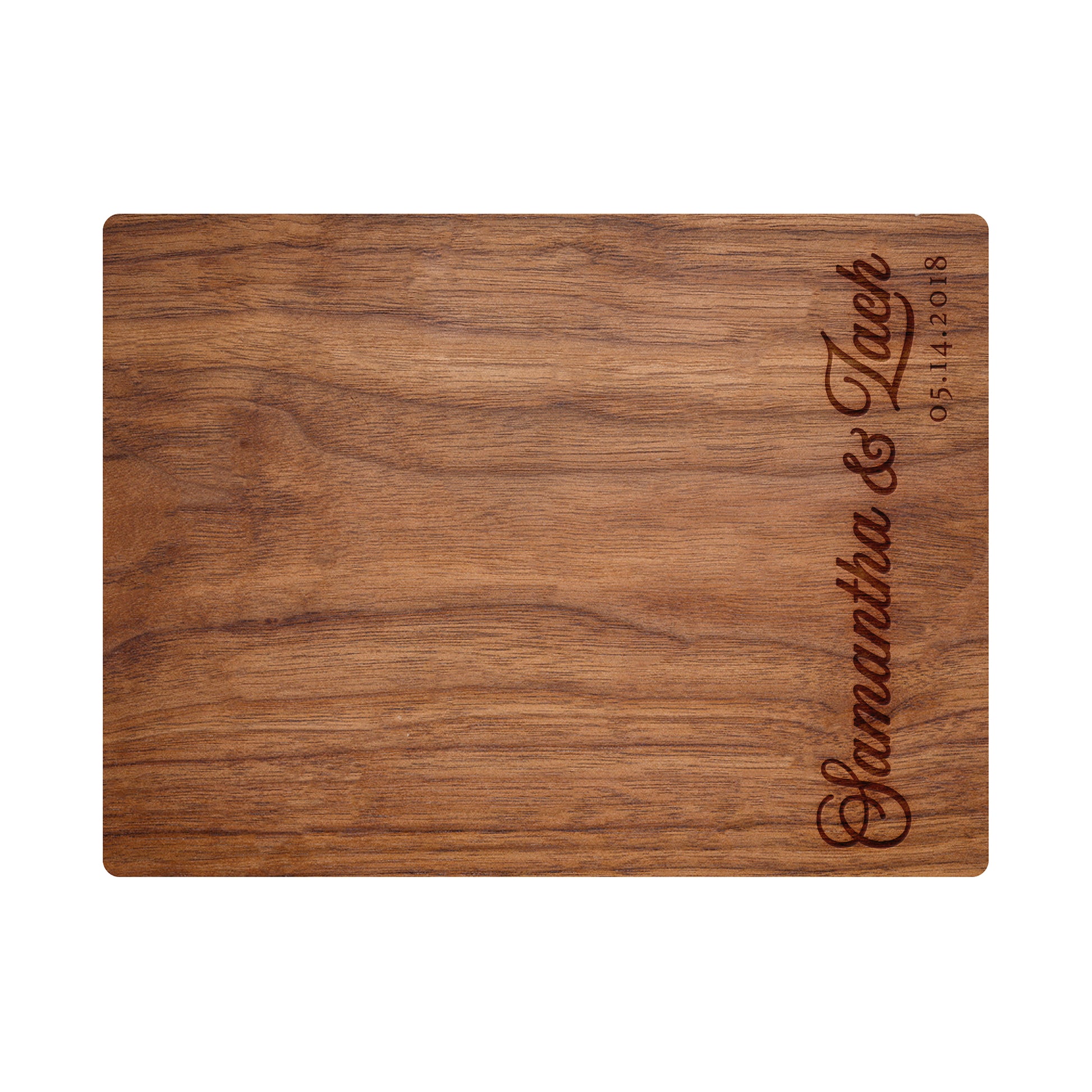 a wooden cutting board with a name on it